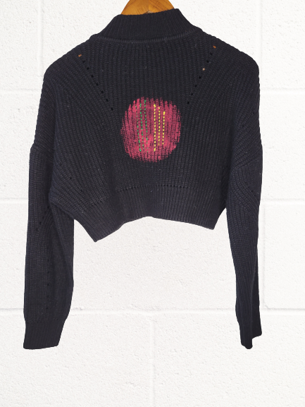 Black Cropped Sweater with Red Gold Green Disc